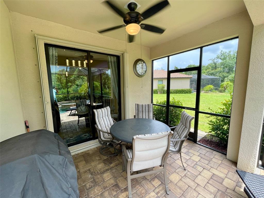 20940 Valore Court Venice, FL 34293 - Photo 30 of 52 a living room with furniture and a large window