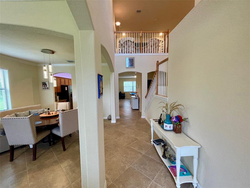 20940 Valore Court Venice, FL 34293 - Photo 3 of 52 a view of a livingroom with furniture and an entryway