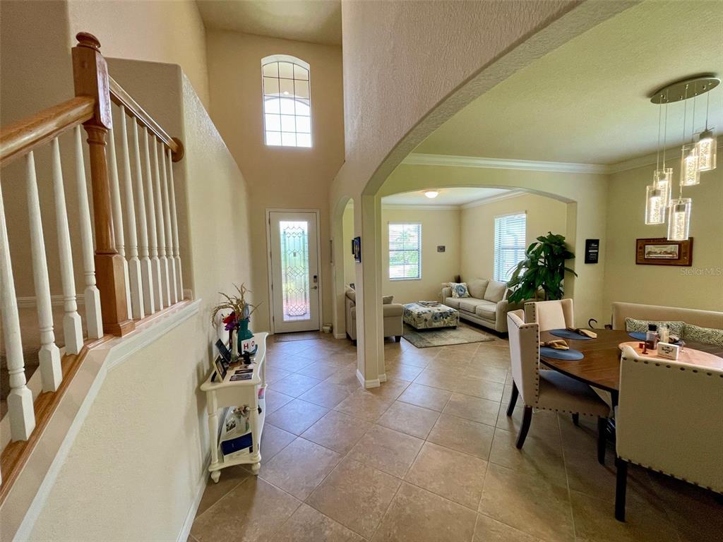 20940 Valore Court Venice, FL 34293 - Photo 4 of 52 a living room with furniture and a large window