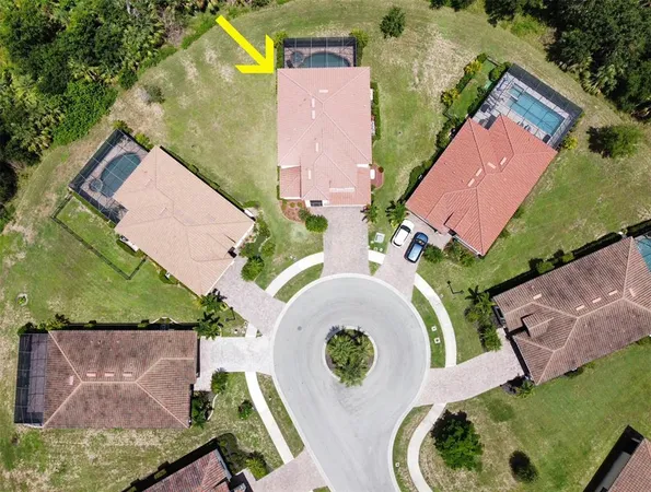 a view of a yard and front view of a house