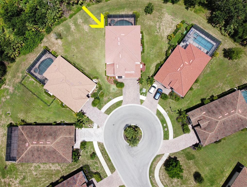 20940 Valore Court Venice, FL 34293 - Photo 43 of 52 an aerial view of a house with a swimming pool