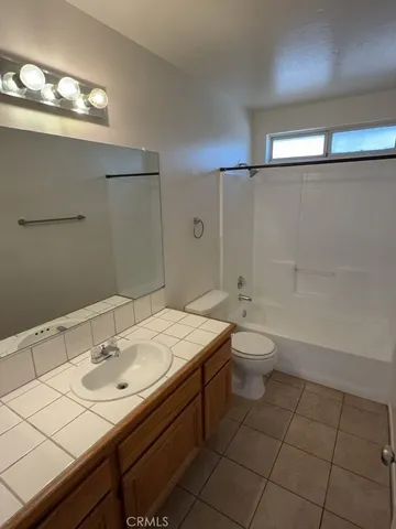 an empty room with a bathroom