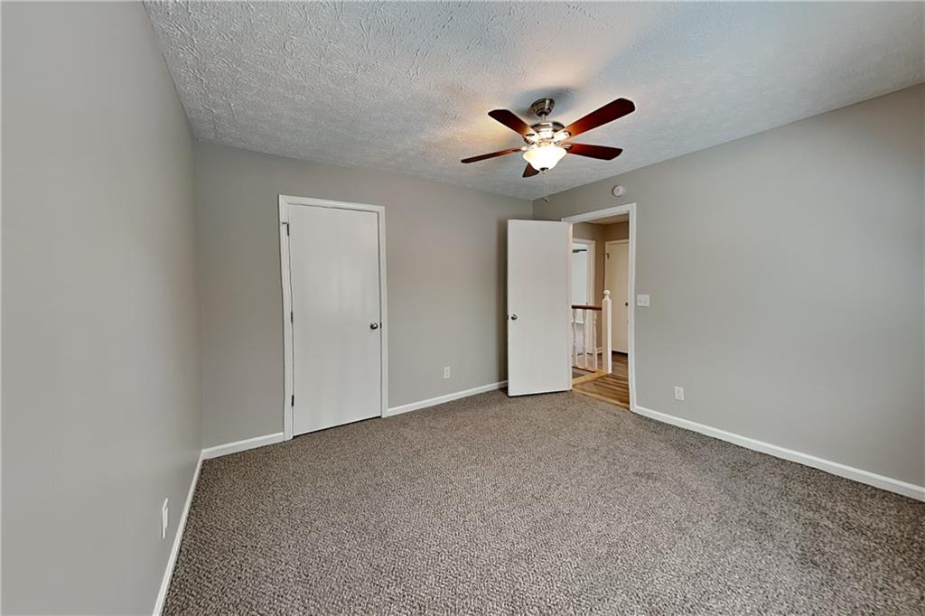 10610 Colony Glen Drive Alpharetta, GA 30022 - Photo 13 of 22 a view of an empty room