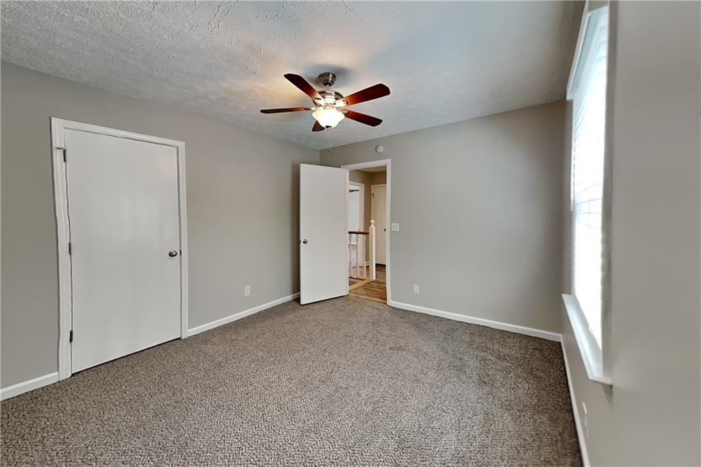 10610 Colony Glen Drive Alpharetta, GA 30022 - Photo 14 of 22 a view of an empty room