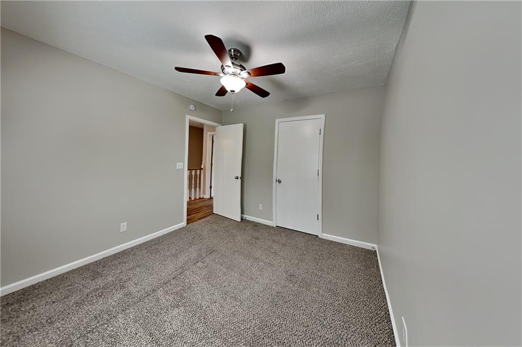 10610 Colony Glen Drive Alpharetta, GA 30022 - Photo 16 of 22 a view of an empty room