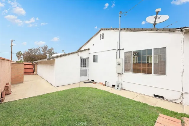 a view of a backyard with a large space