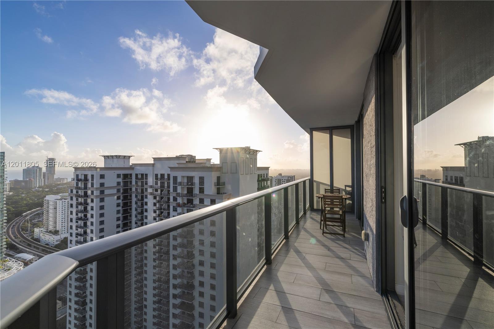 55 Southwest 9th Street, Unit 3404 Miami, FL 33130 - Photo 9 of 25 a view of a balcony with city view