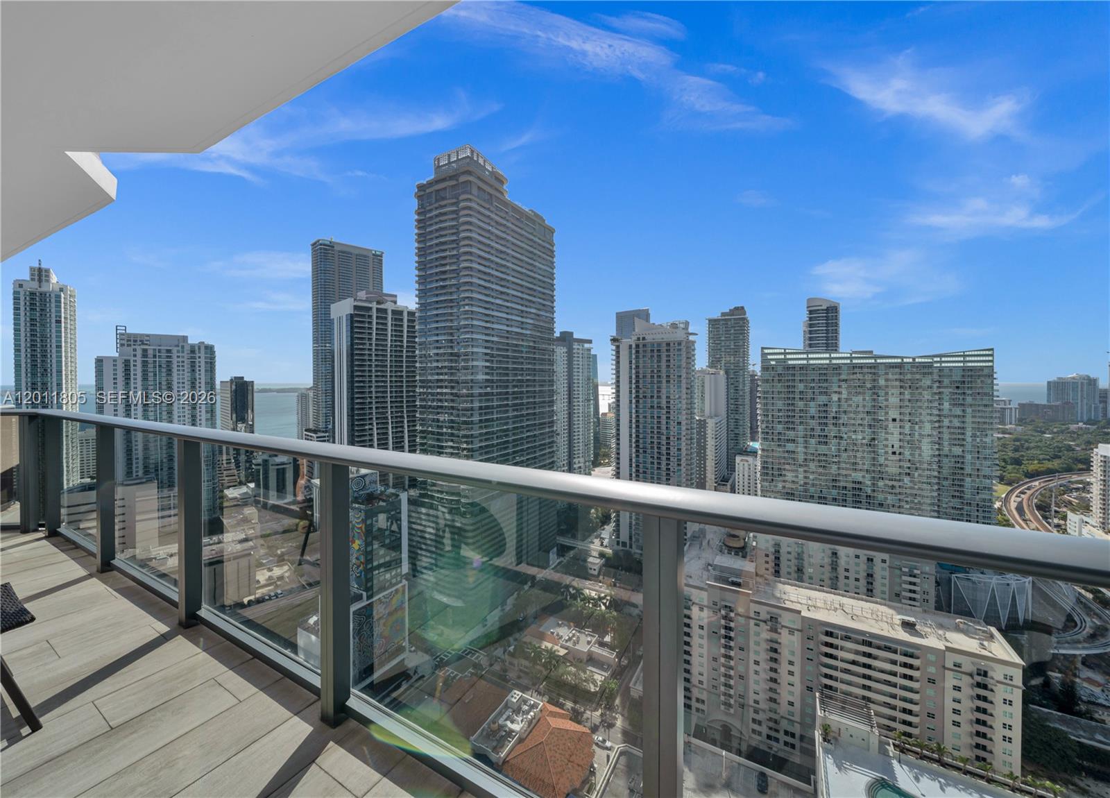 55 Southwest 9th Street, Unit 3404 Miami, FL 33130 - Photo 10 of 25 a view of a balcony with city view