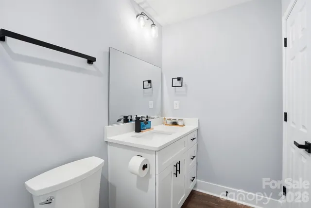 a bathroom with a shower and a glass door