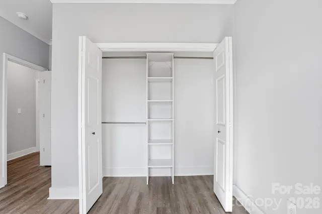 a bathroom with a bathtub a toilet and a shower