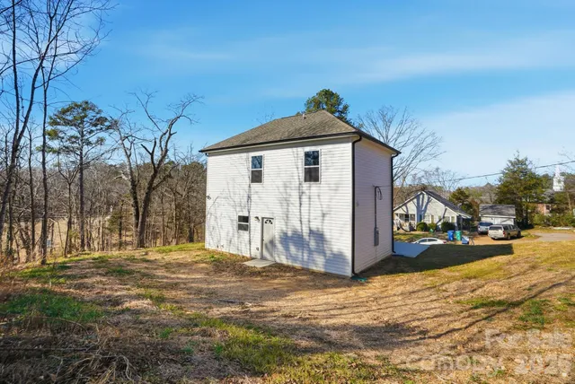 a view of backyard with green space