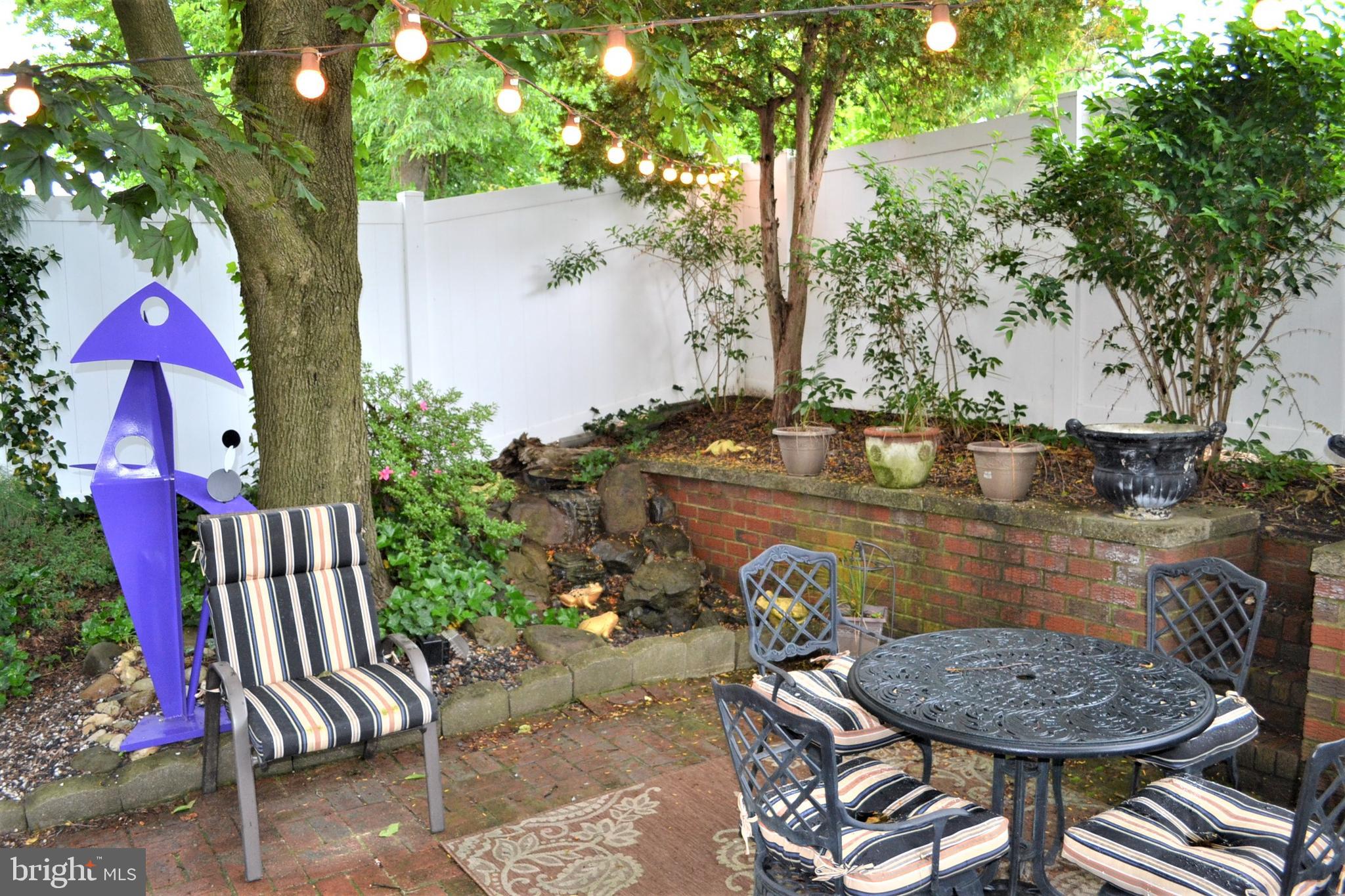 8531 Ridgeway Street Philadelphia, PA 19111 - Photo 40 of 44 Rear patio with water fall and pond