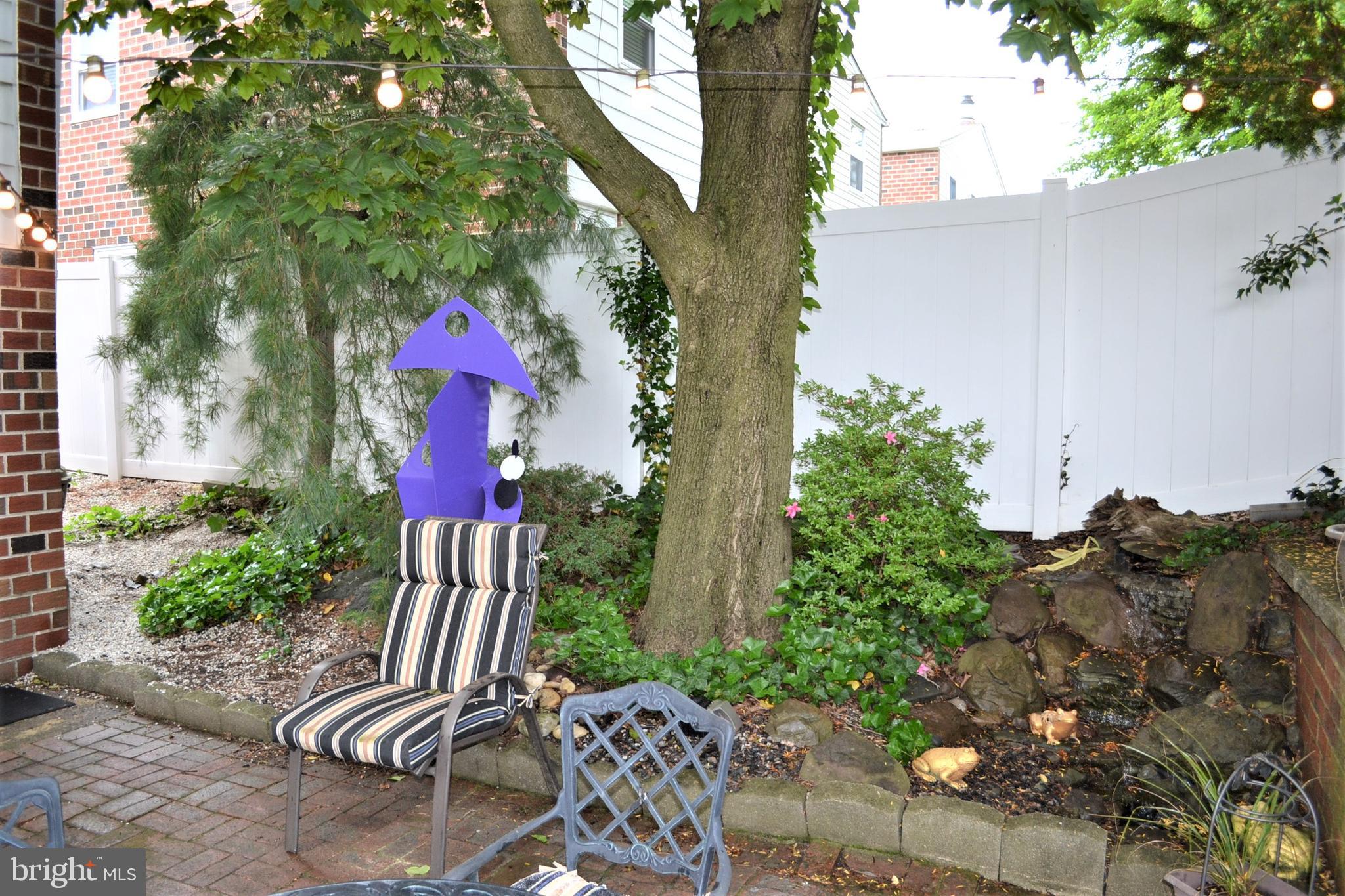 8531 Ridgeway Street Philadelphia, PA 19111 - Photo 42 of 44 Rear patio with lush landscaping
