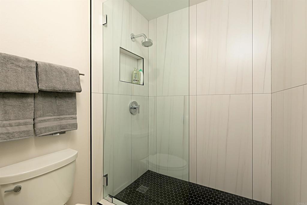 1202 North Pacific Street, Unit 106B Oceanside, CA 92054 - Photo 18 of 18 a bathroom with a shower
