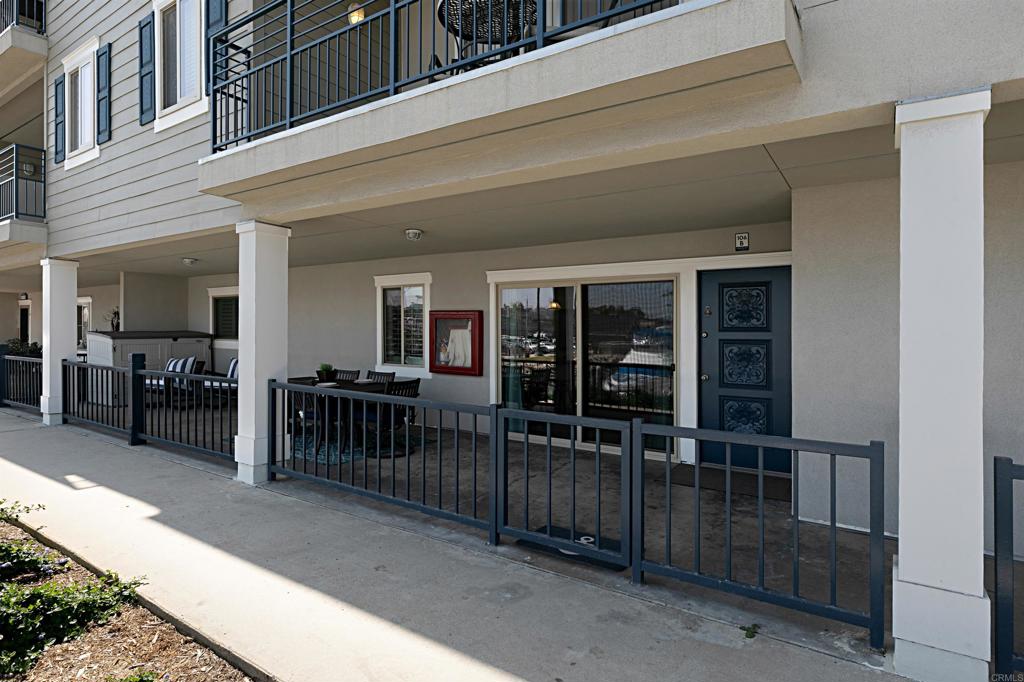 1202 North Pacific Street, Unit 106B Oceanside, CA 92054 - Photo 5 of 18 a view of a house with balcony