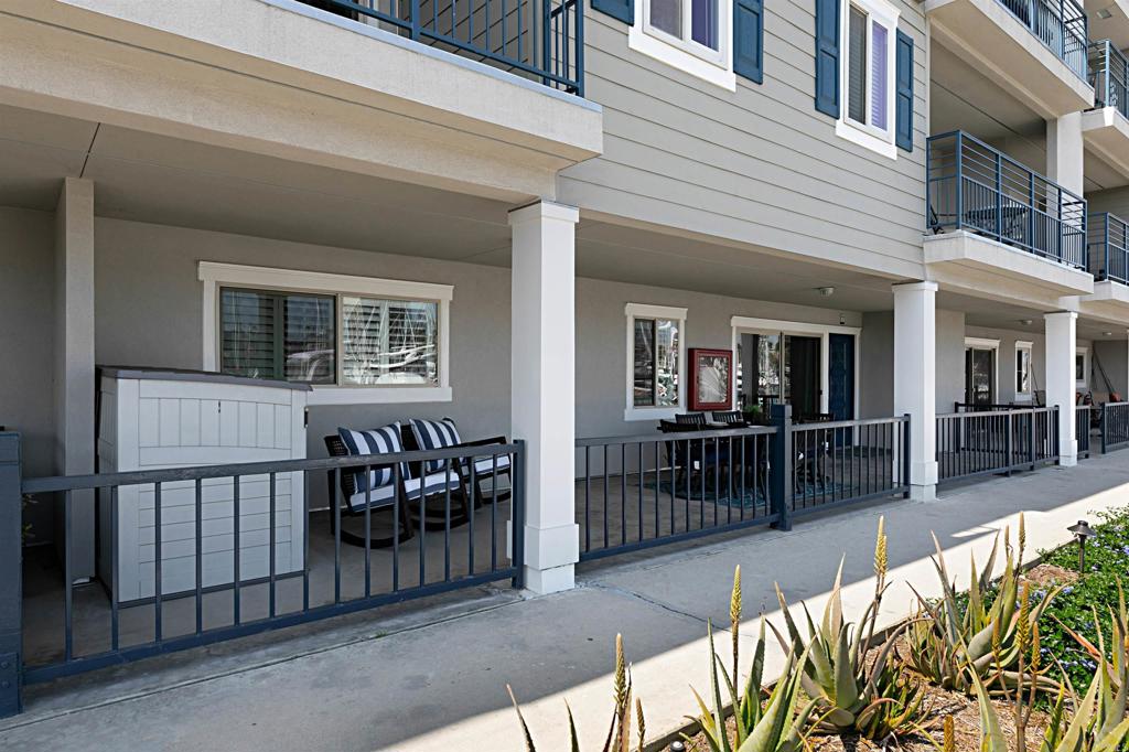 1202 North Pacific Street, Unit 106B Oceanside, CA 92054 - Photo 6 of 18 a view of a house with a balcony