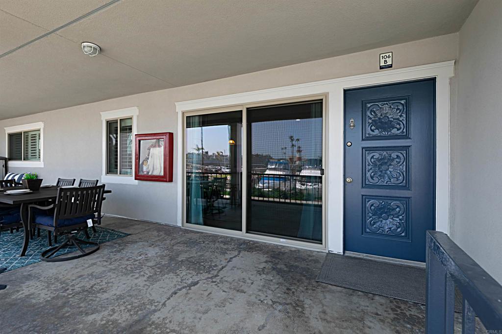 1202 North Pacific Street, Unit 106B Oceanside, CA 92054 - Photo 7 of 18 a view of a livingroom with furniture and window