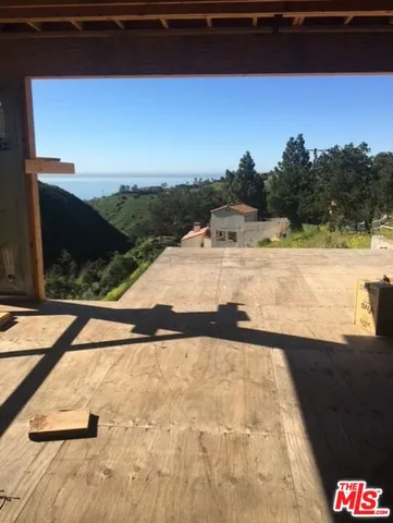 a view of an outdoor space and a lake view