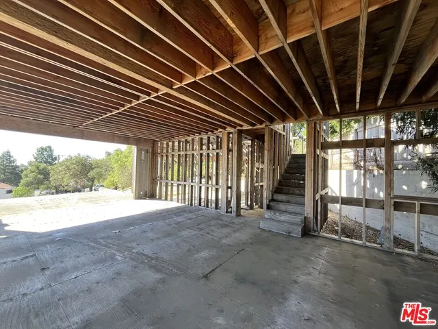 a view of large room with wooden floor