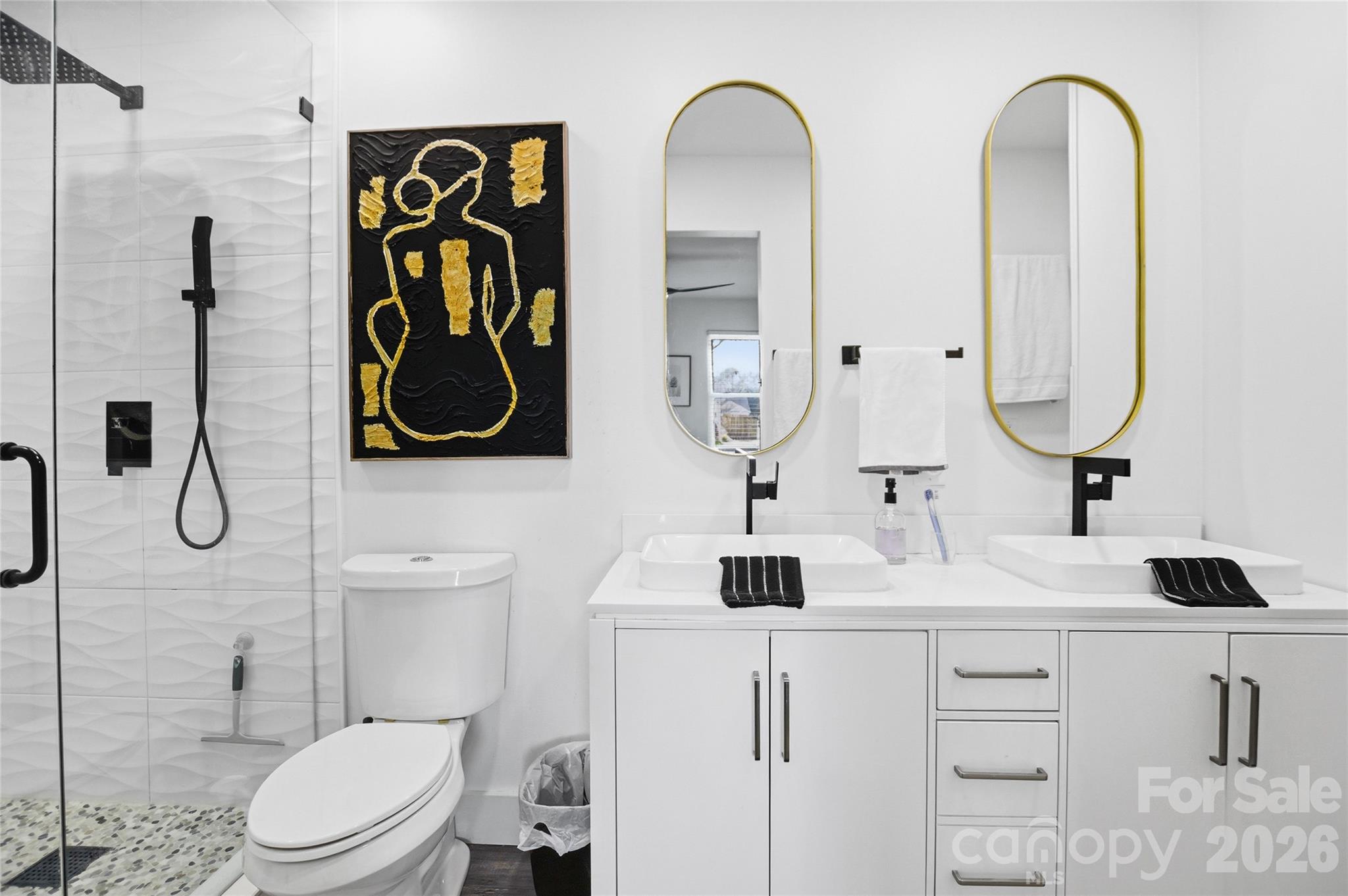 3056 Brookchase Boulevard Fort Mill, SC 29707 - Photo 11 of 23 a bathroom with a toilet sink and mirror