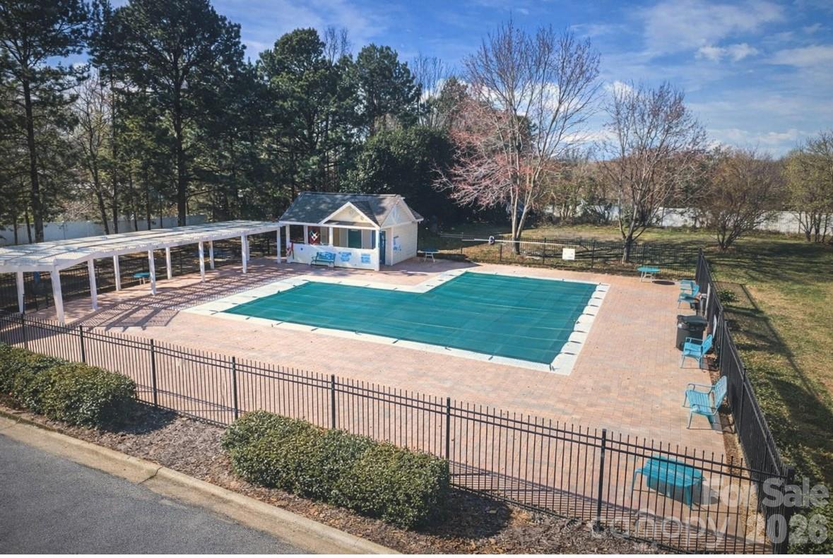 3056 Brookchase Boulevard Fort Mill, SC 29707 - Photo 22 of 23 a view of a house with backyard and trees
