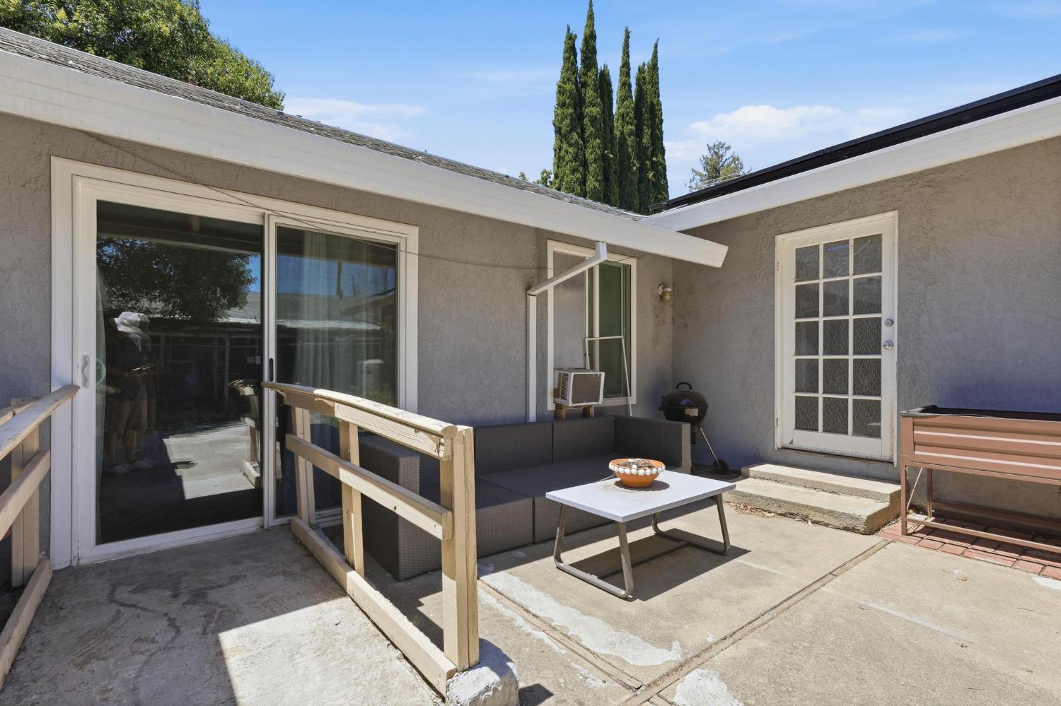 920 Bogue Road Yuba City, CA 95991 - Photo 21 of 26 Central patio with ramp access to wide hall and family room