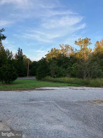 a view of field with green space