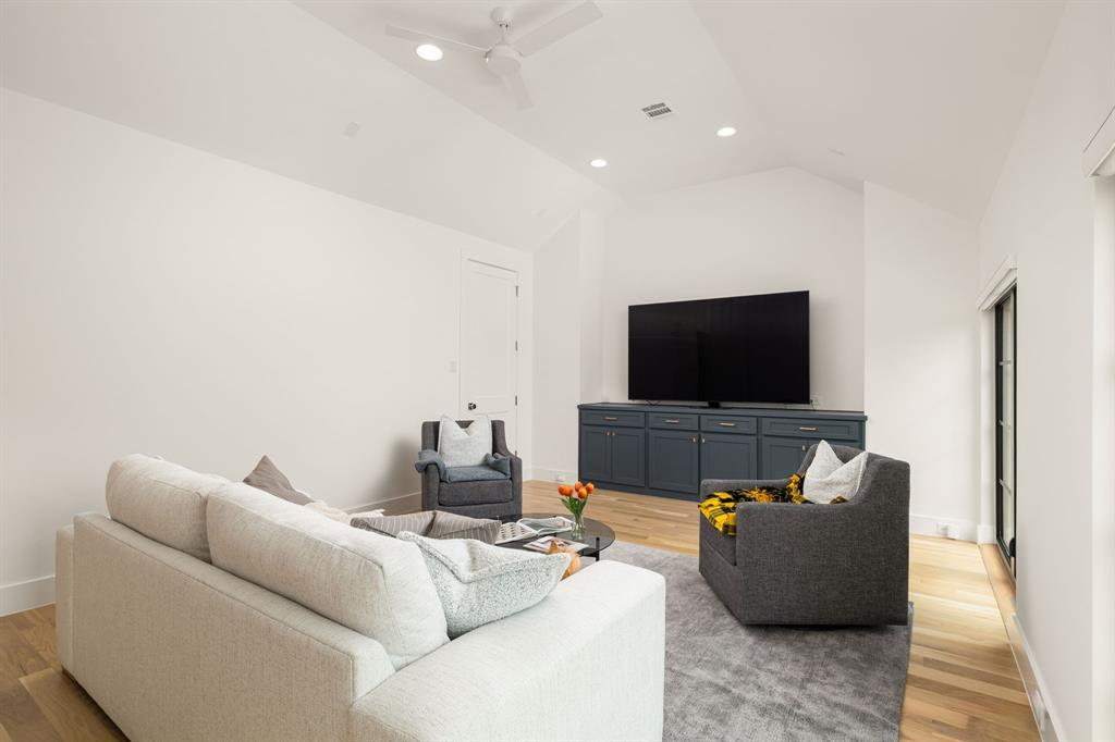 5019 Lark Lane Dallas, TX 75209 - Photo 16 of 32 a living room with furniture and a flat screen tv