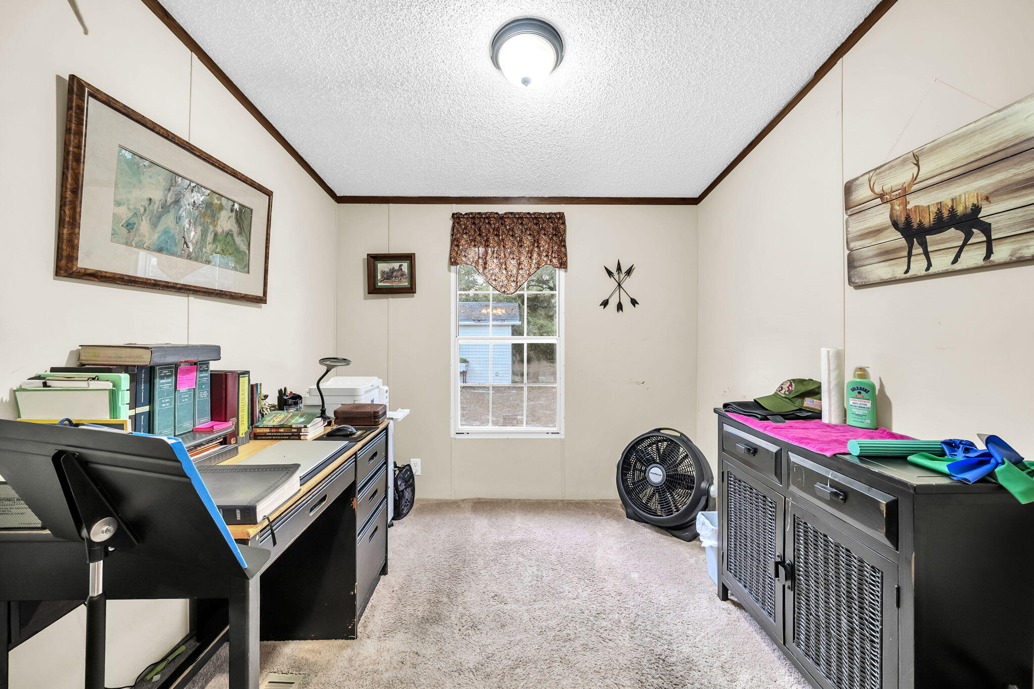 1422 Cat-Mar Road Niceville, FL 32578 - Photo 18 of 35 a bedroom with furniture and a bed