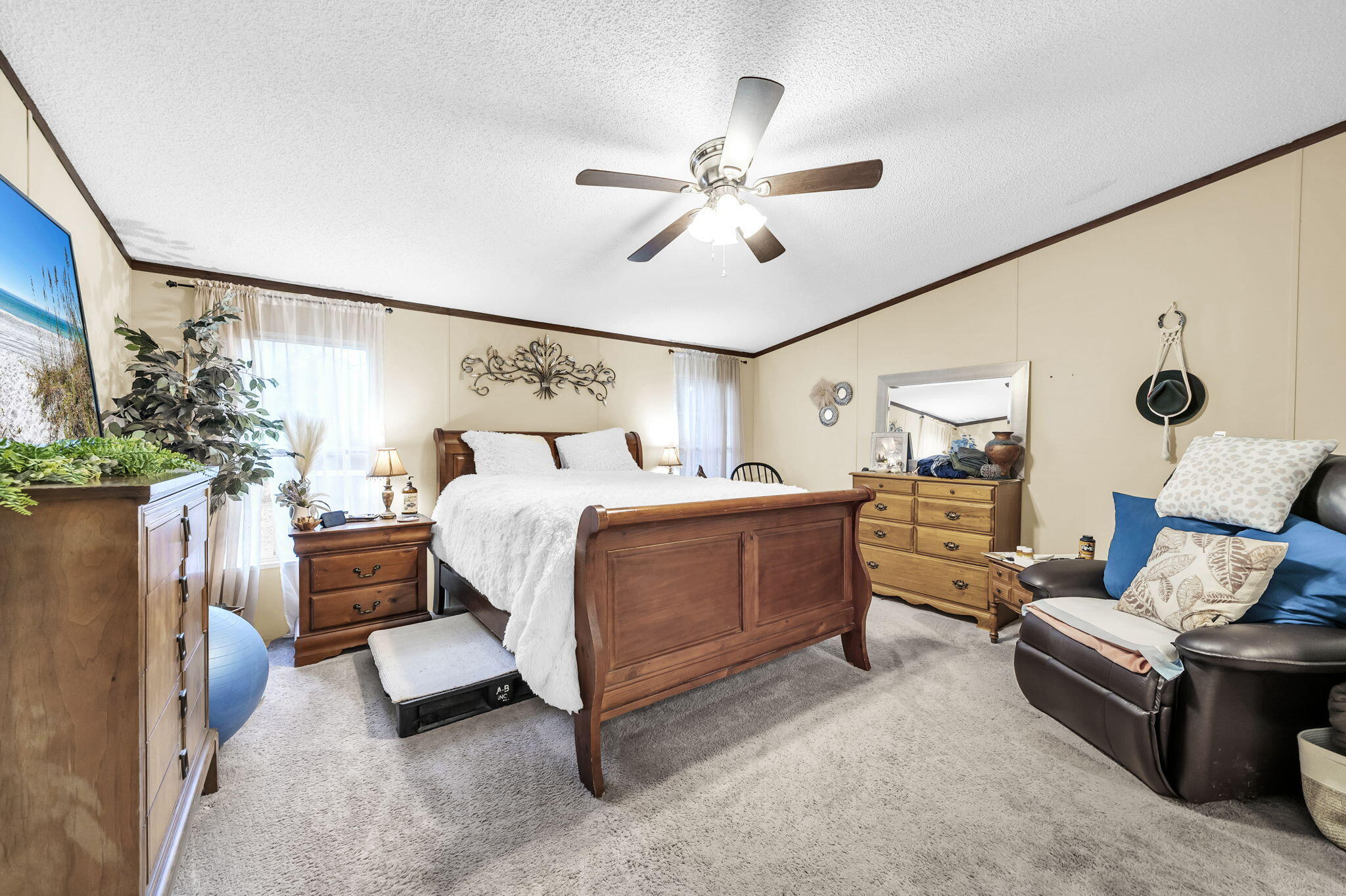 1422 Cat-Mar Road Niceville, FL 32578 - Photo 19 of 35 a bedroom with furniture and windows