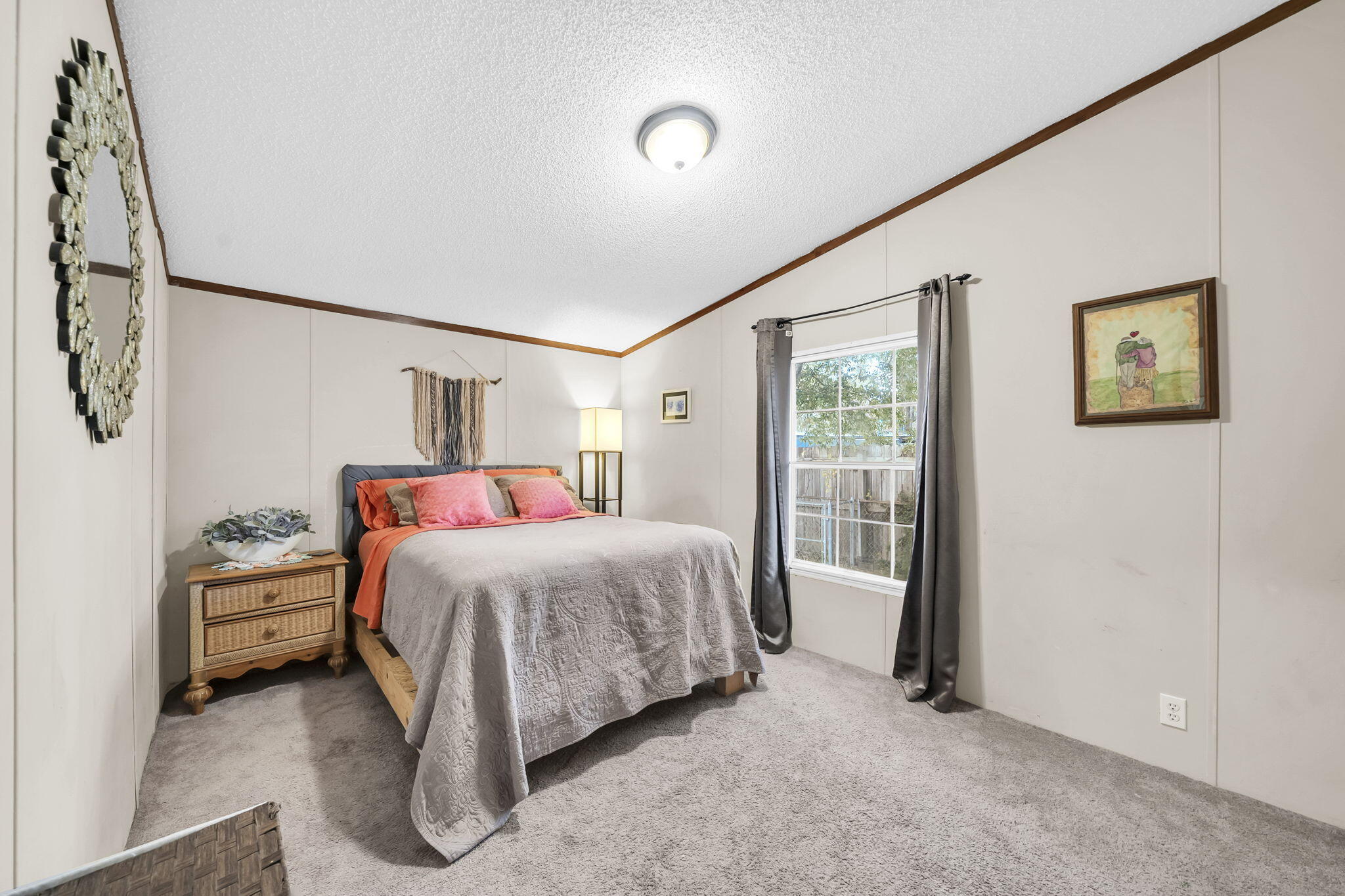 1422 Cat-Mar Road Niceville, FL 32578 - Photo 24 of 35 a bedroom with a bed and a window