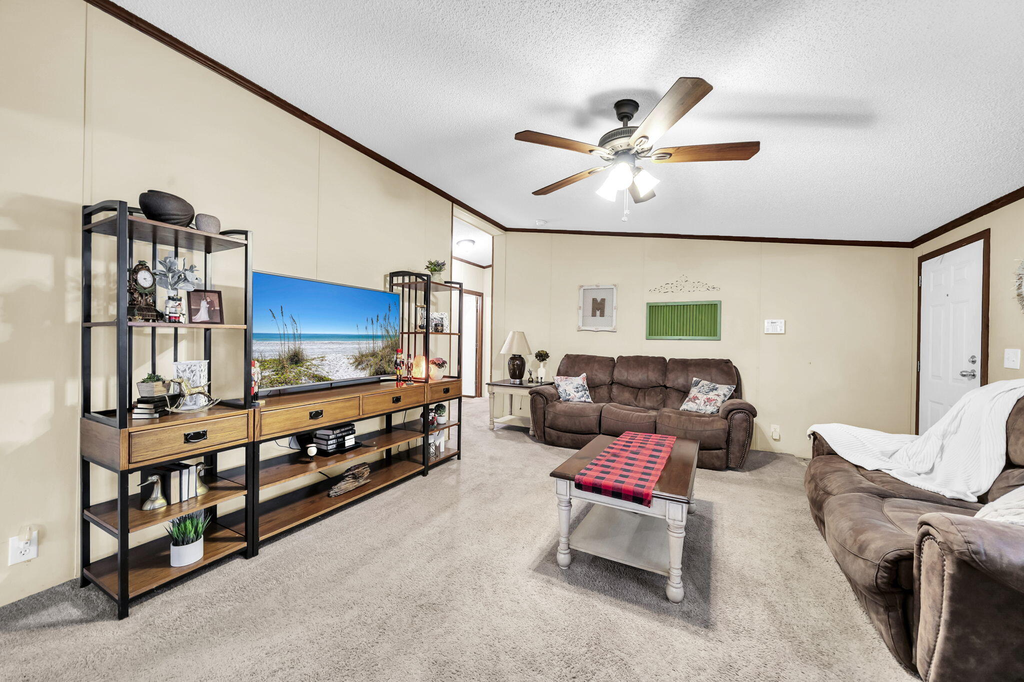 1422 Cat-Mar Road Niceville, FL 32578 - Photo 7 of 35 a living room with furniture and a flat screen tv