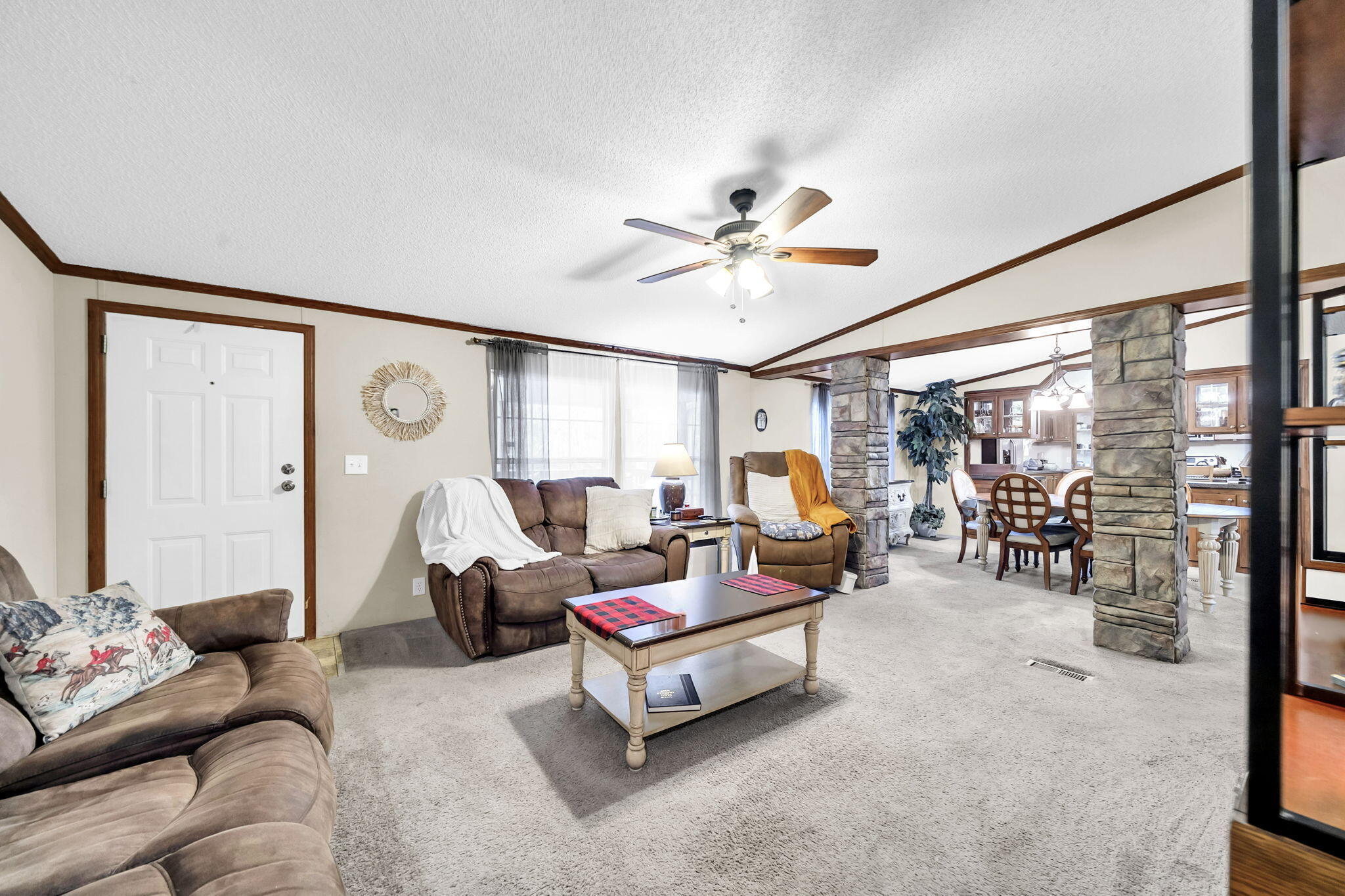 1422 Cat-Mar Road Niceville, FL 32578 - Photo 8 of 35 a living room with furniture and a large window