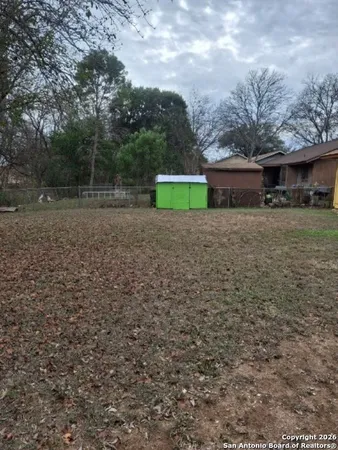 a house view with a backyard space