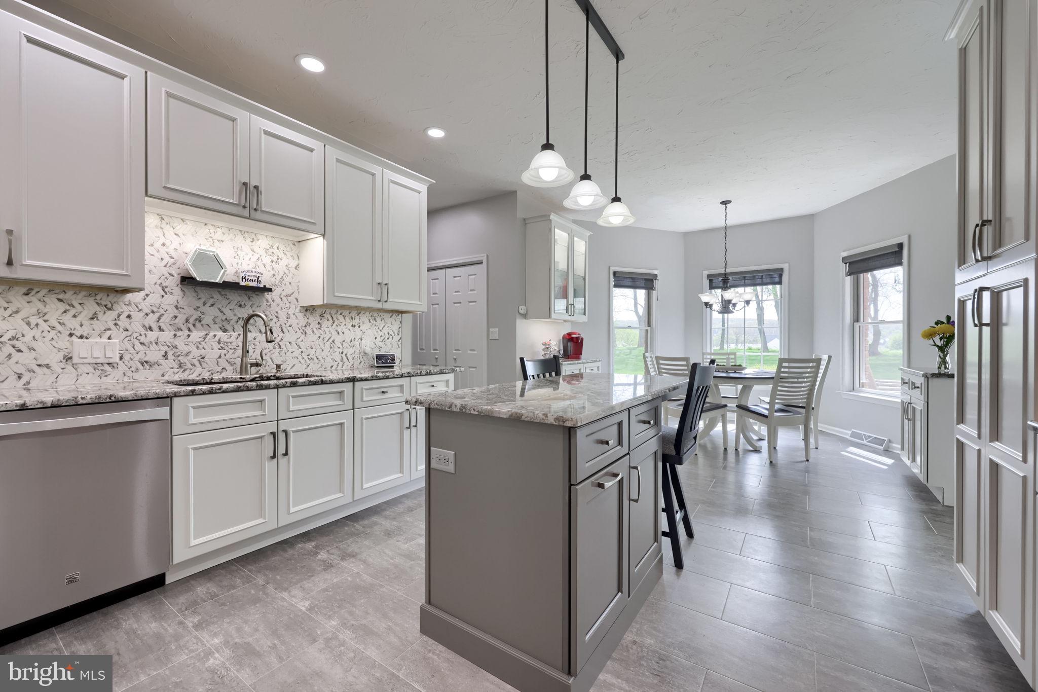 2702 Chestnut Run Road York, PA 17402 - Photo 17 of 65 a kitchen with lots of counter top space and wooden floor