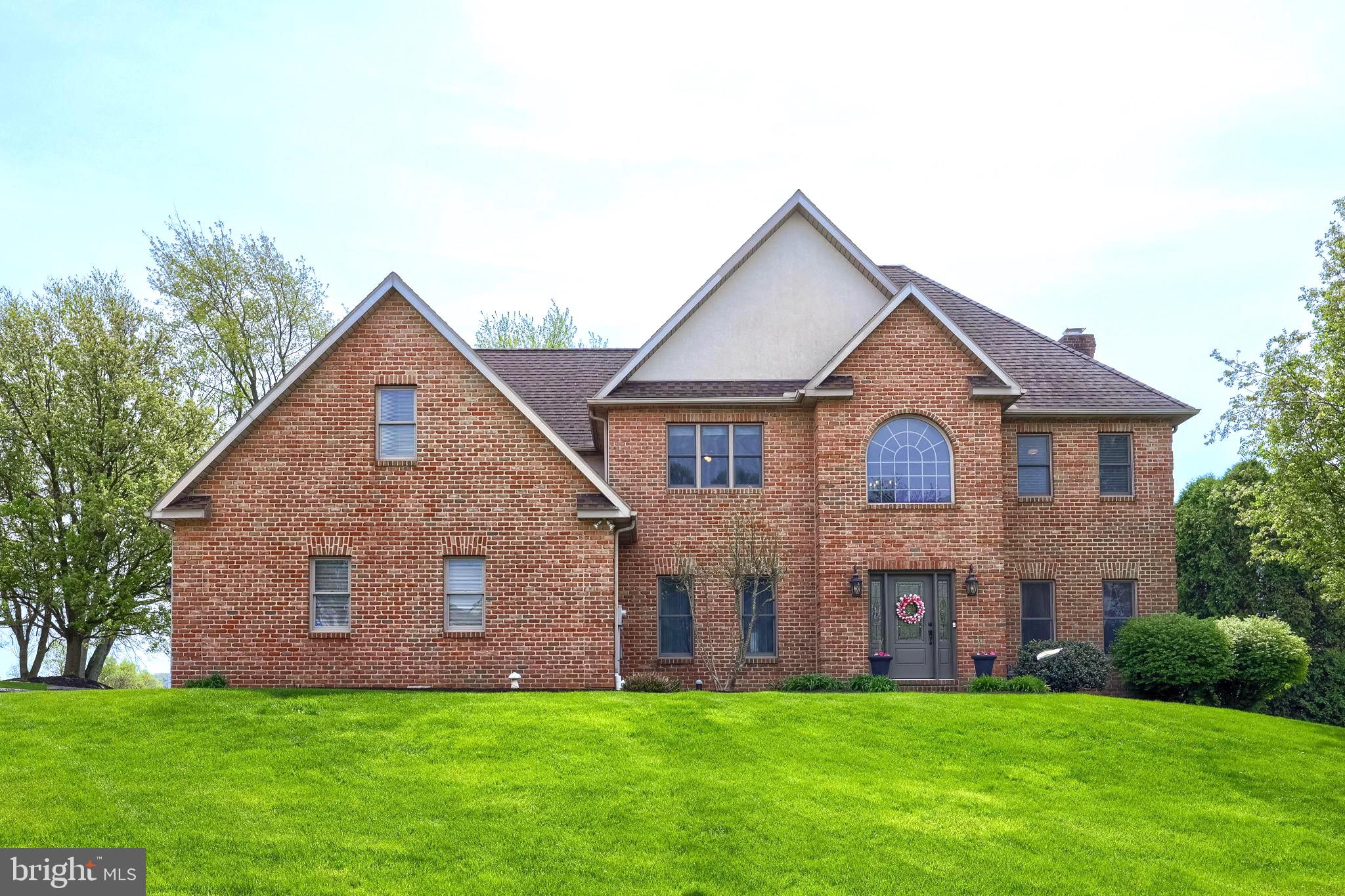 2702 Chestnut Run Road York, PA 17402 - Photo 3 of 65 a front view of a house with a yard