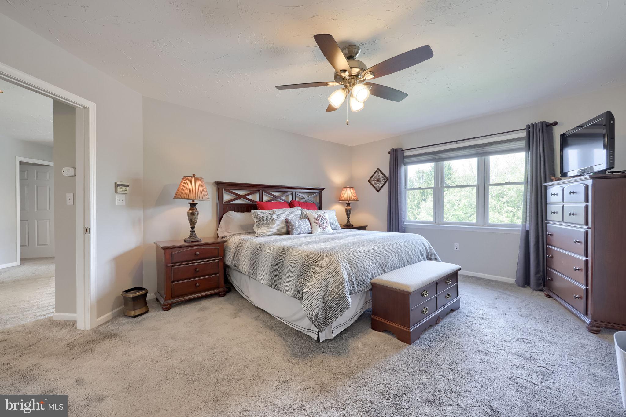 2702 Chestnut Run Road York, PA 17402 - Photo 31 of 65 a spacious bedroom with a bed and window