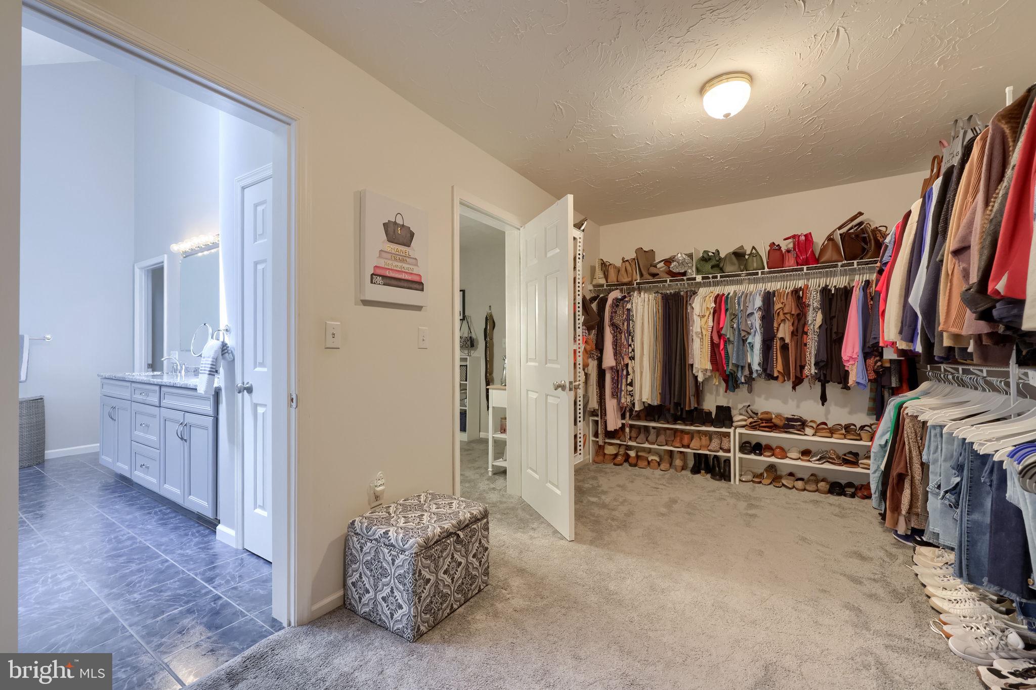2702 Chestnut Run Road York, PA 17402 - Photo 33 of 65 a view of walk in closet with clothes and shoes