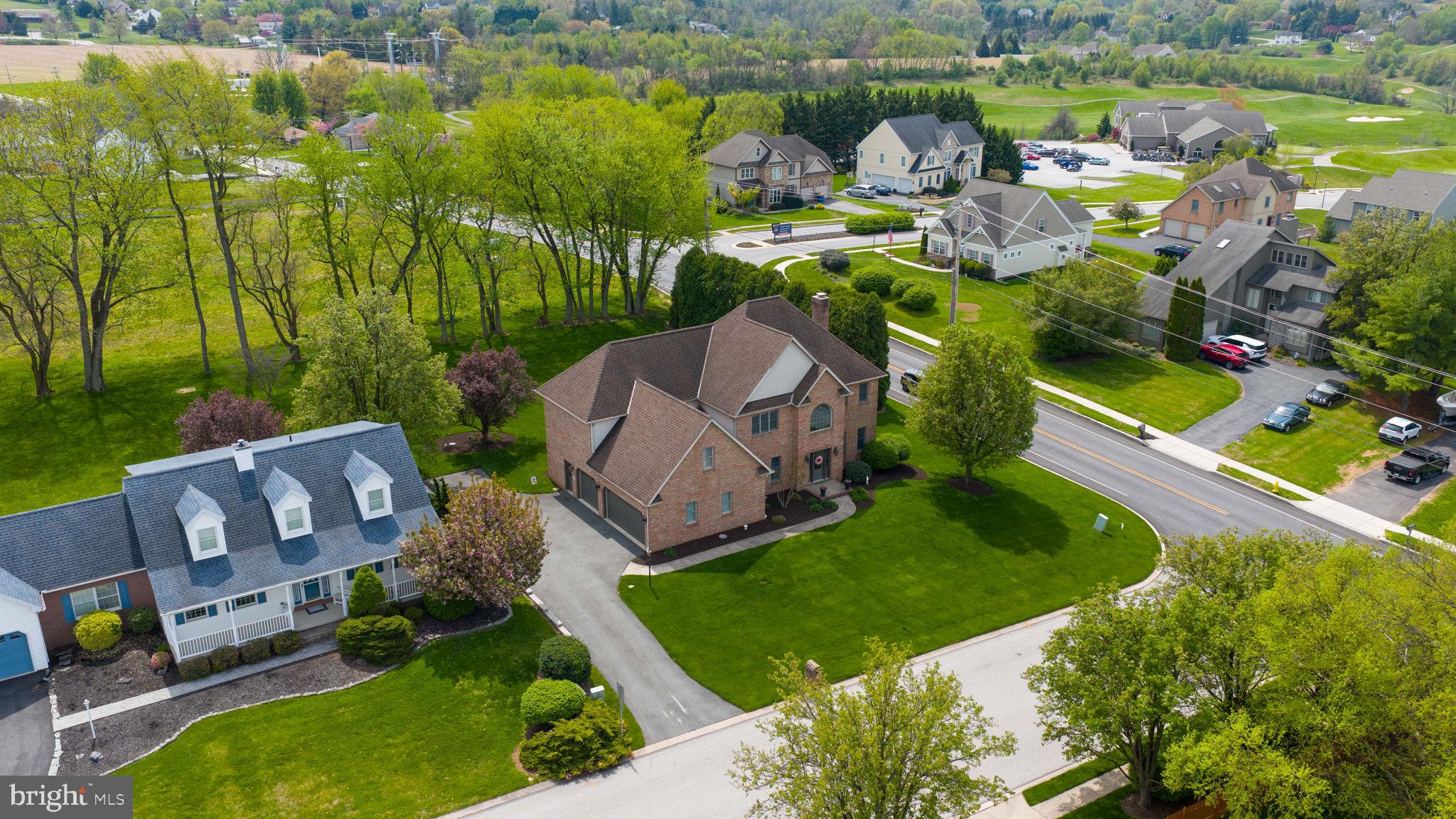 2702 Chestnut Run Road York, PA 17402 - Photo 59 of 65 an aerial view of a house with a garden and lake view