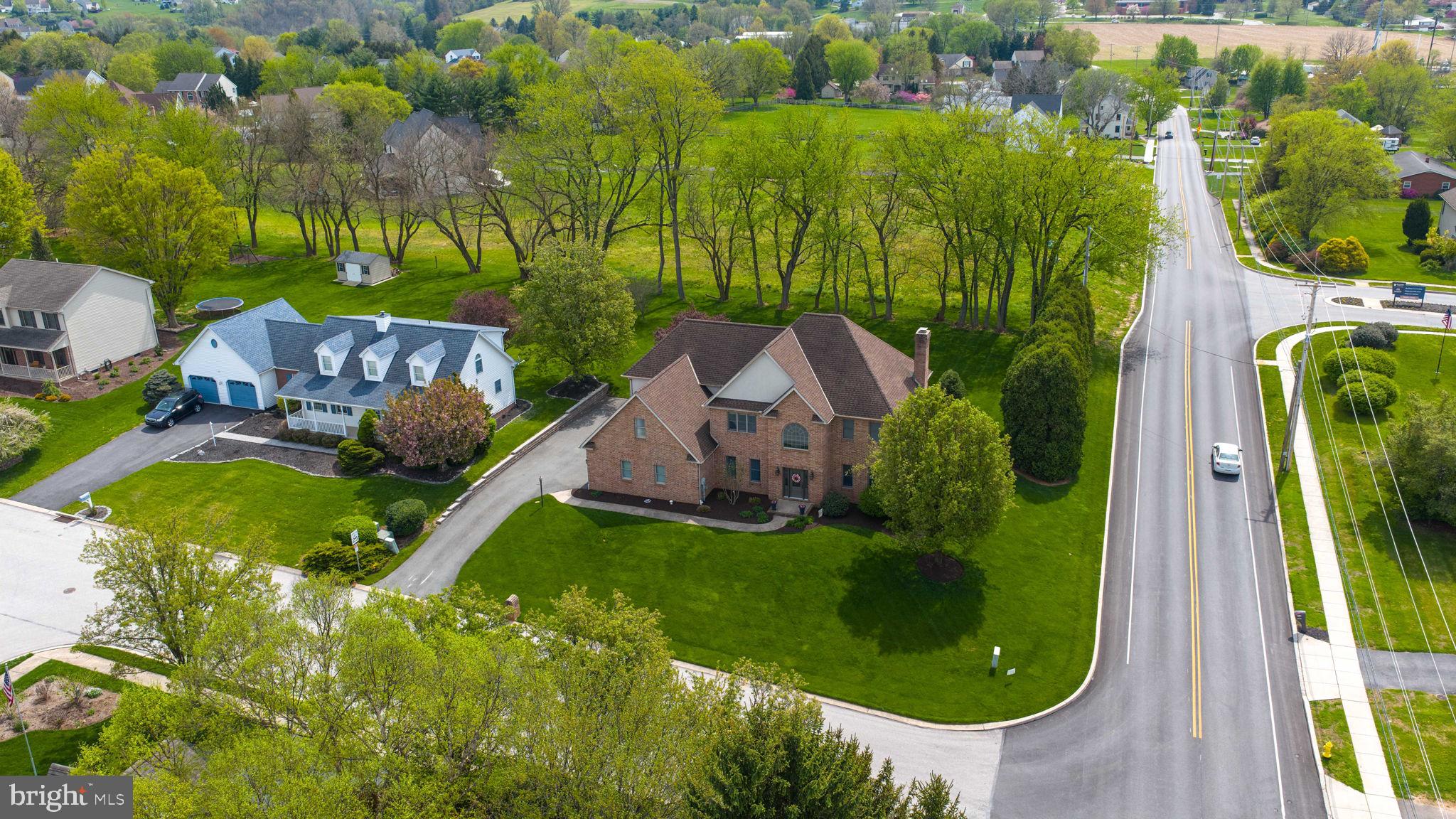 2702 Chestnut Run Road York, PA 17402 - Photo 60 of 65 an aerial view of a house with garden space and street view