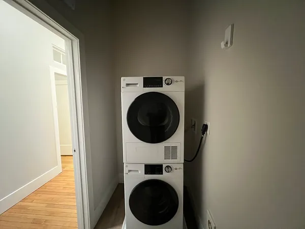 a utility room with dryer and washer