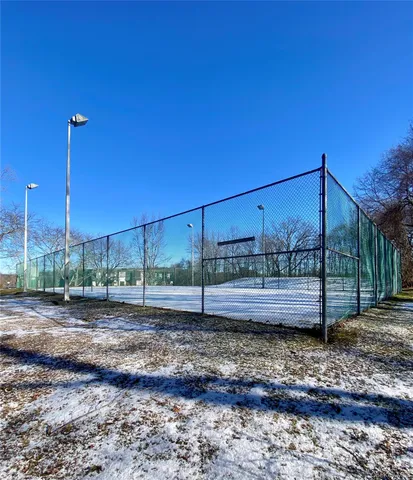 a view of a swimming pool with a yard