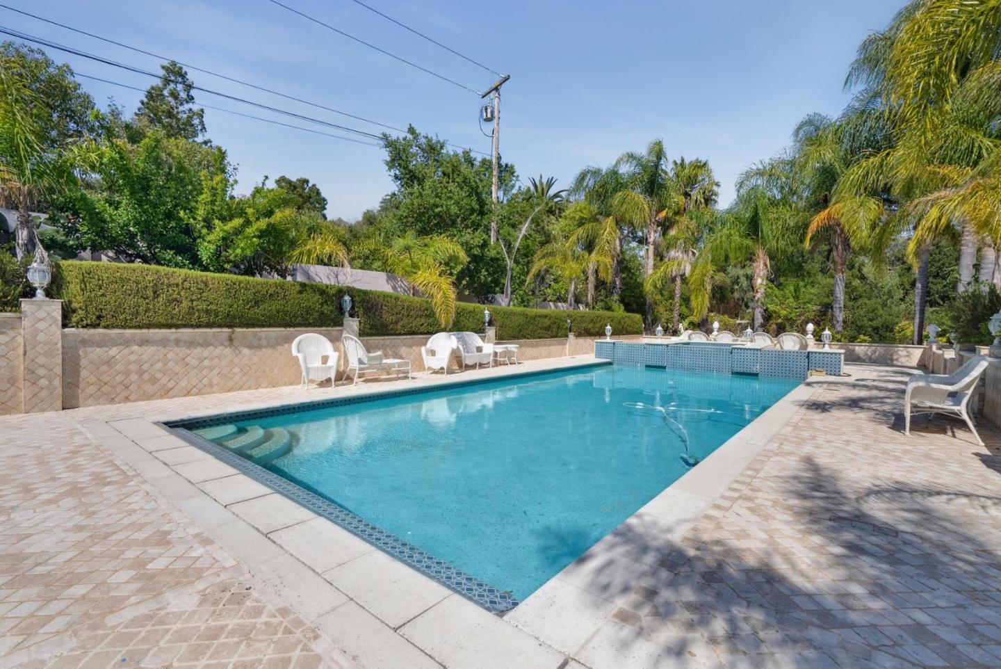 15360 Karl Avenue Monte Sereno, CA 95030 - Photo 6 of 10 a view of a swimming pool with a patio