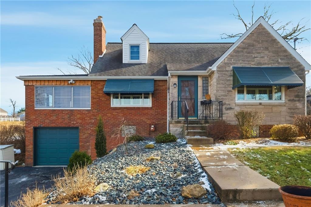 509 Brownstown Road Irwin, PA 15642 - Photo 2 of 47 a front view of a house with garden