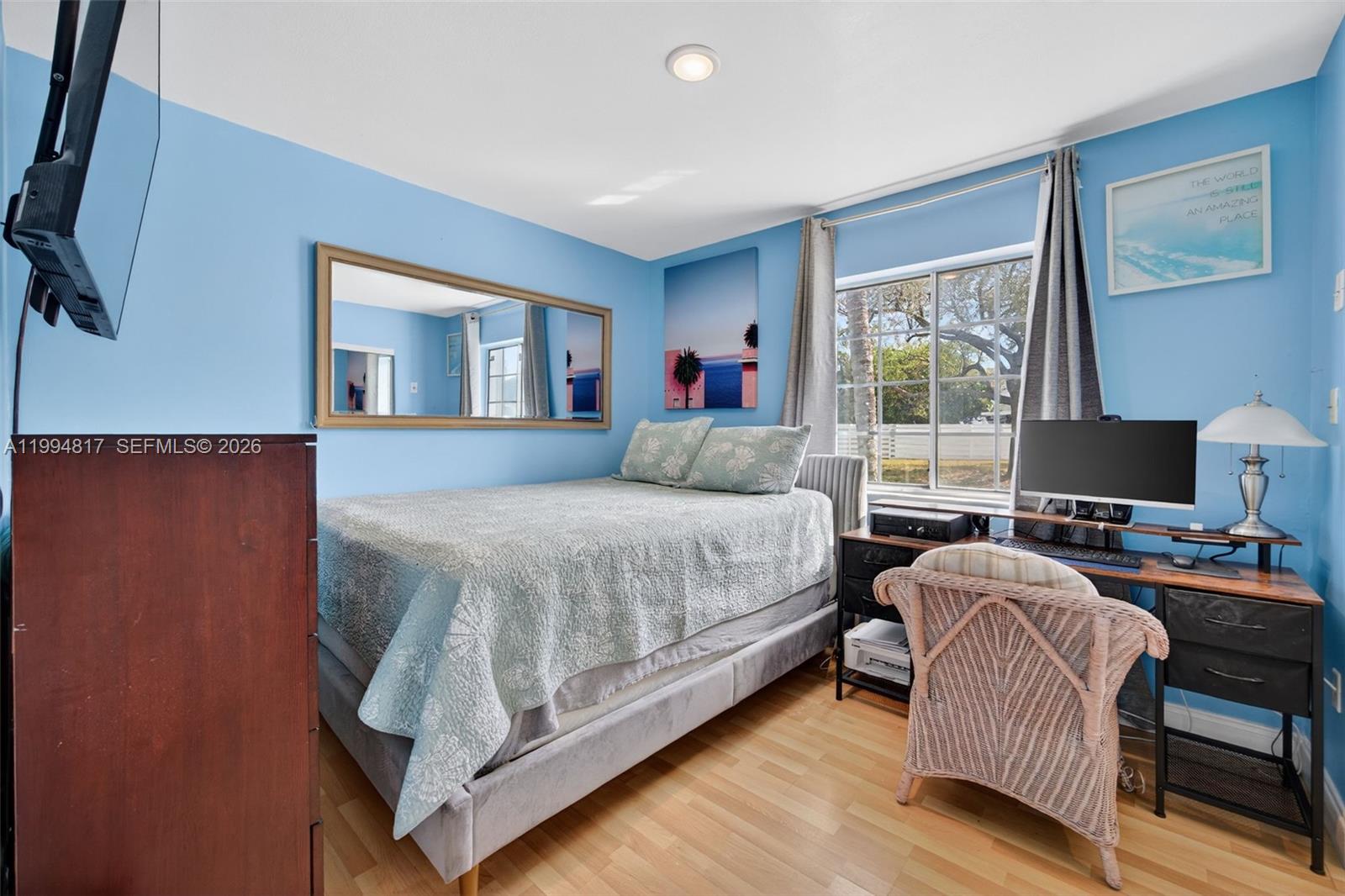 14610 Southwest 145th Place Miami, FL 33186 - Photo 21 of 52 a bedroom with a bed and a couch