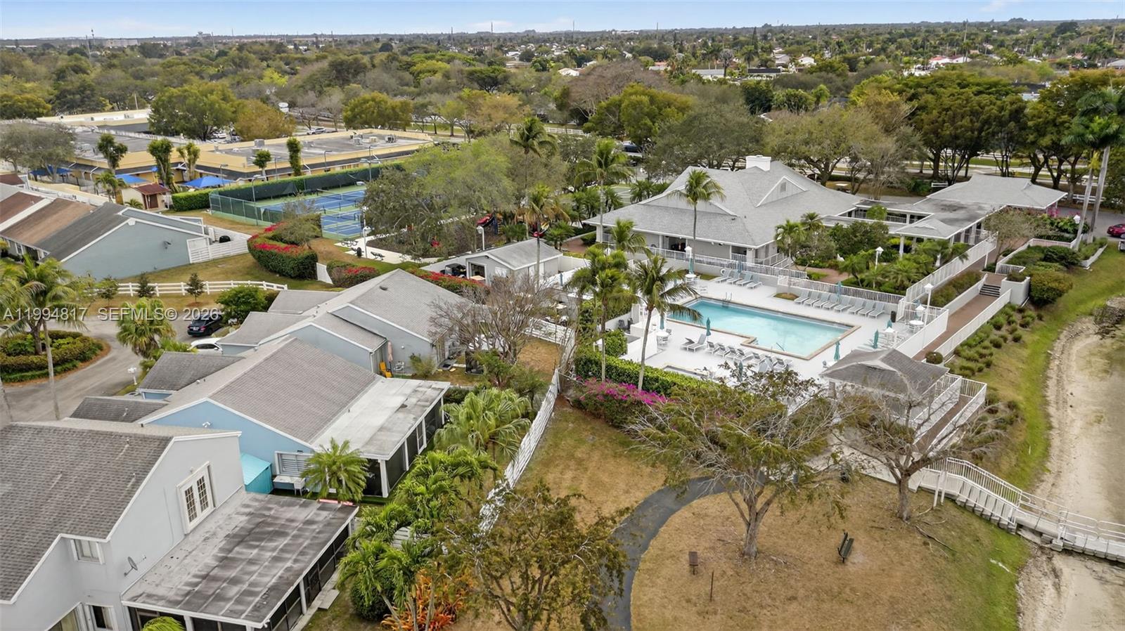 14610 Southwest 145th Place Miami, FL 33186 - Photo 46 of 52 an aerial view of a house with a yard