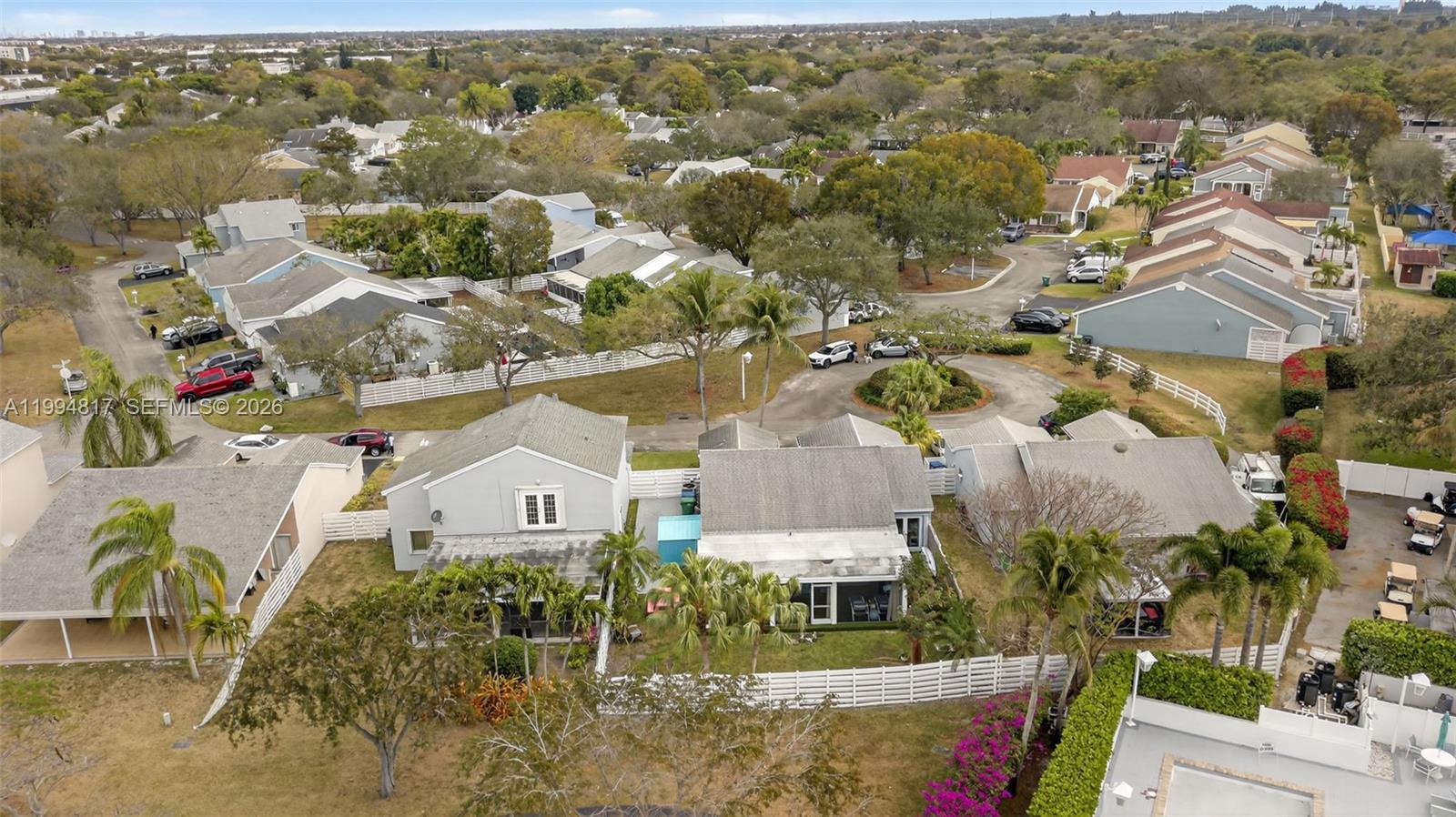 14610 Southwest 145th Place Miami, FL 33186 - Photo 47 of 52 an aerial view of residential houses with outdoor space