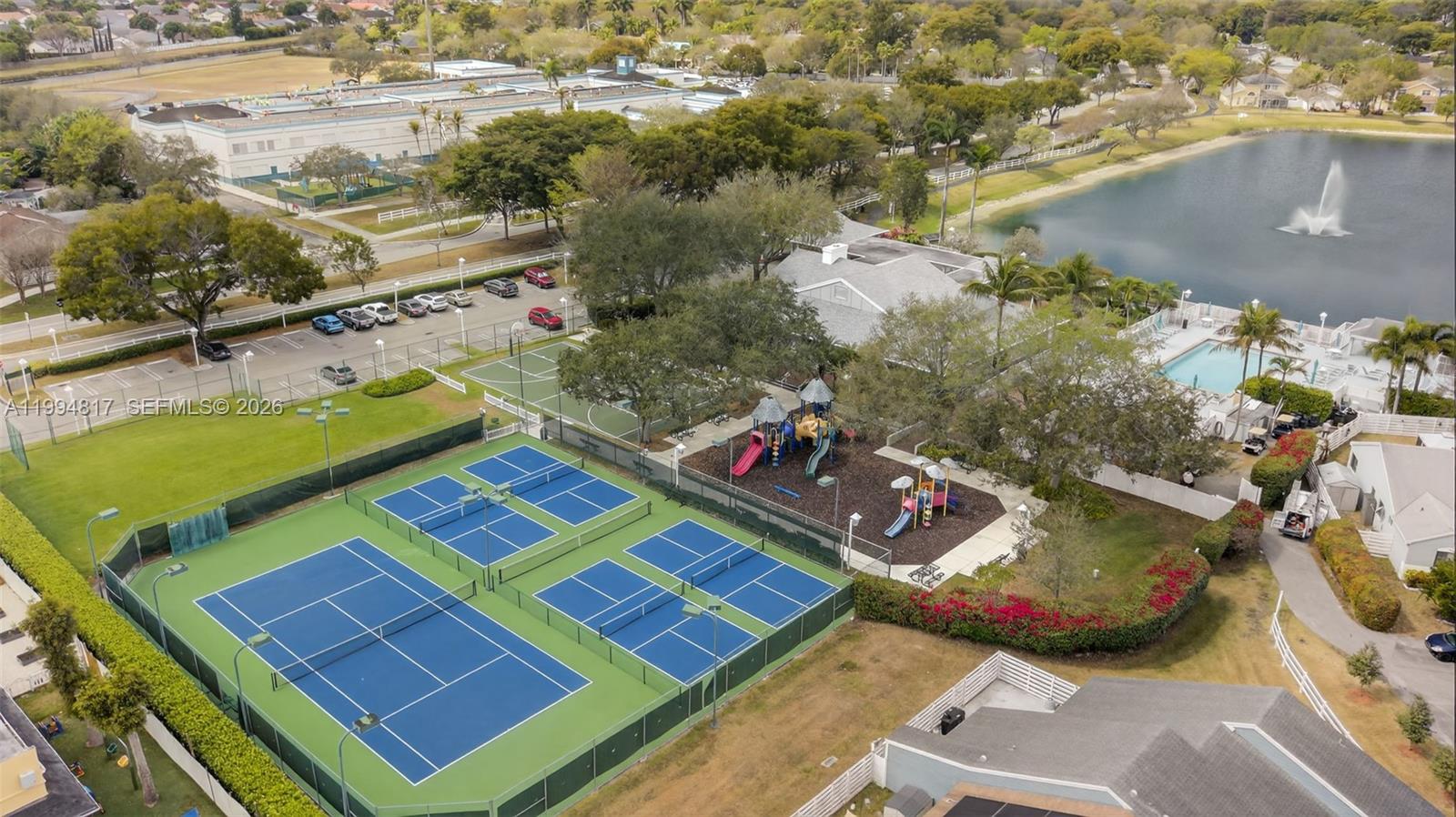 14610 Southwest 145th Place Miami, FL 33186 - Photo 51 of 52 an aerial view of a pool patio and mountain view