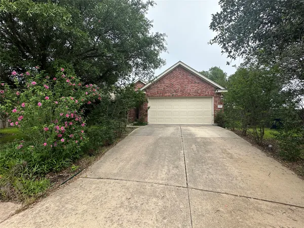 a house with trees in the background