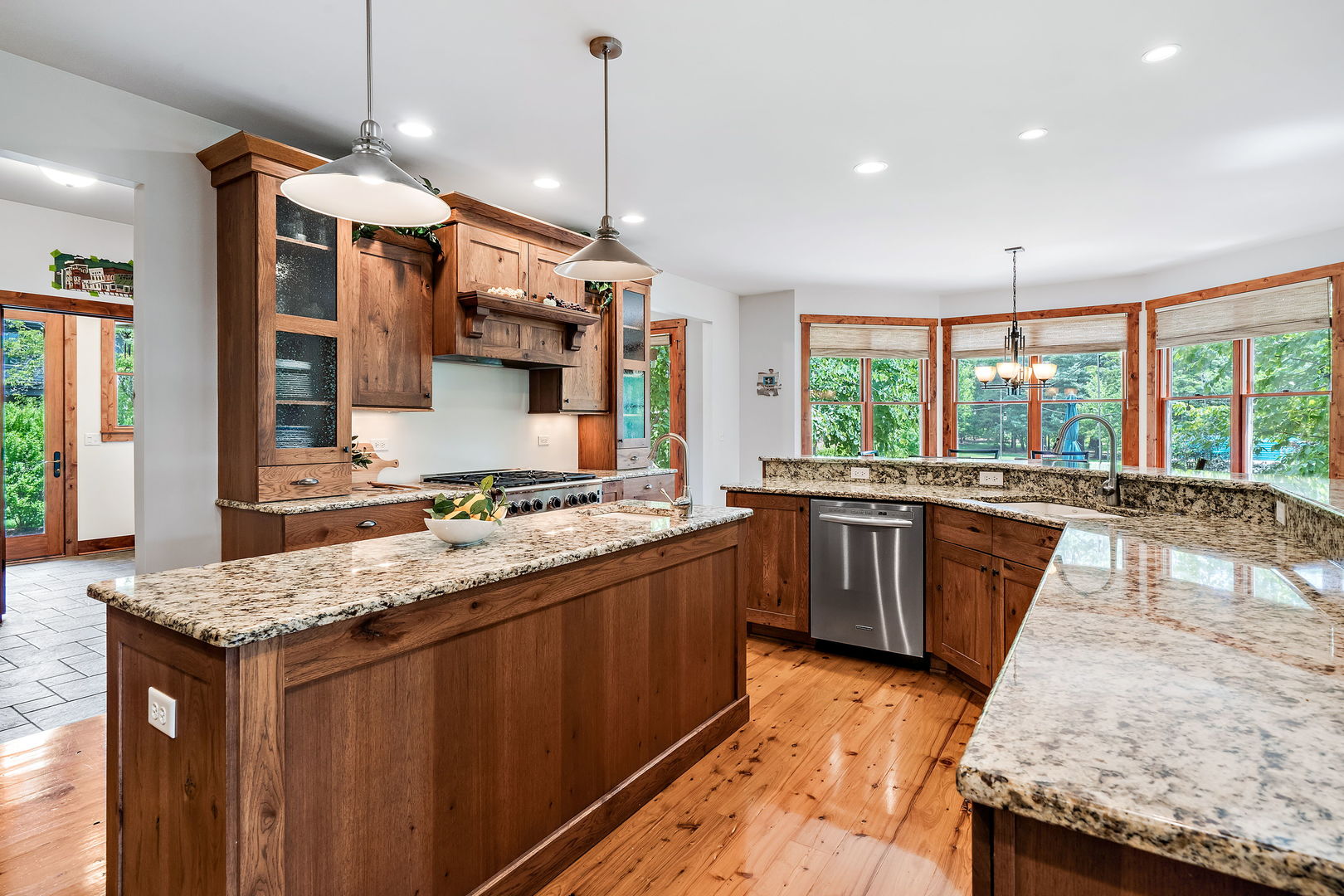 4511 Cumnor Road Downers Grove, IL 60515 - Photo 12 of 42 a kitchen with a stove sink and cabinets